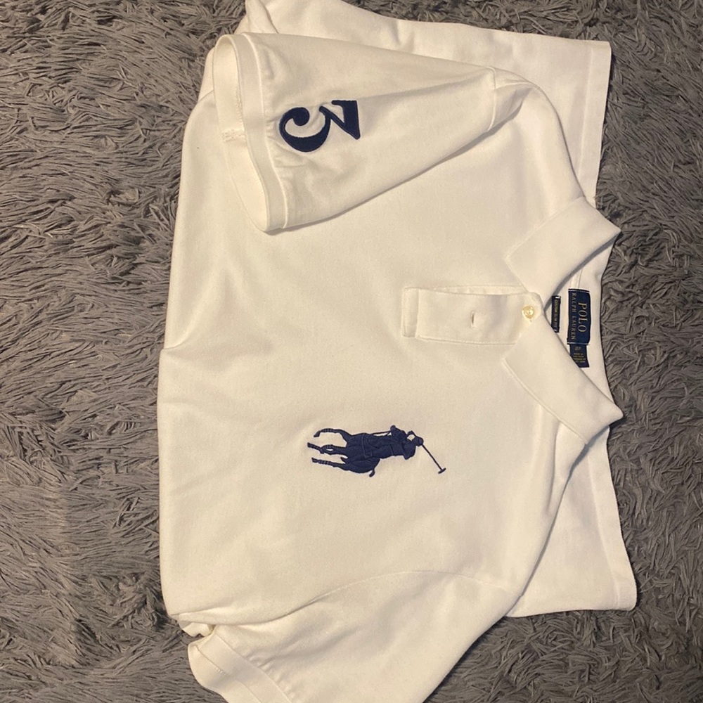 Polo white shirt with big polo sign and 3 on sleeve.